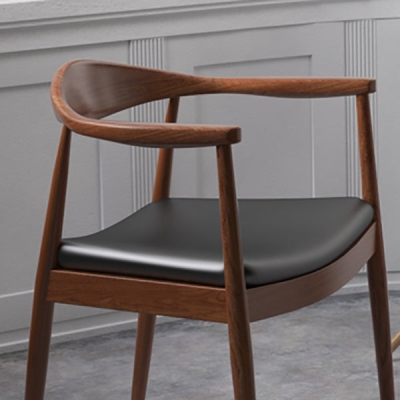 Poltrona imbottita per sala da pranzo con schienale aperto in legno per la casa moderna