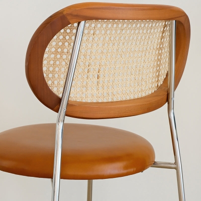 Sedia da pranzo in ecopelle con finitura lucida e gambe in metallo per cucina