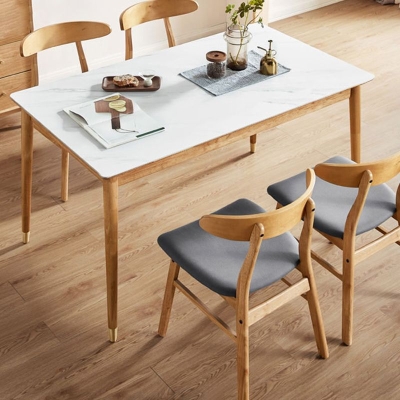 Tavolo da pranzo moderno rettangolare in pietra con gambe in rovere marrone
