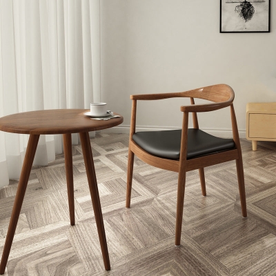 Poltrona imbottita per sala da pranzo con schienale aperto in legno per la casa moderna
