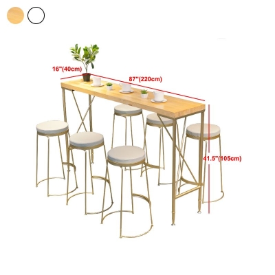 Rechteckiger Bartisch aus massivem Holz mit goldenen Beinen und Metallsockel