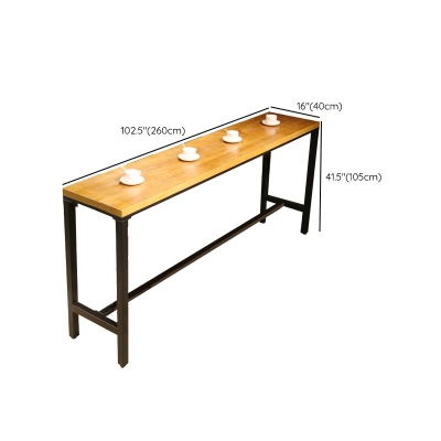 Tavolo da bar rettangolare con gambe nere e base in metallo