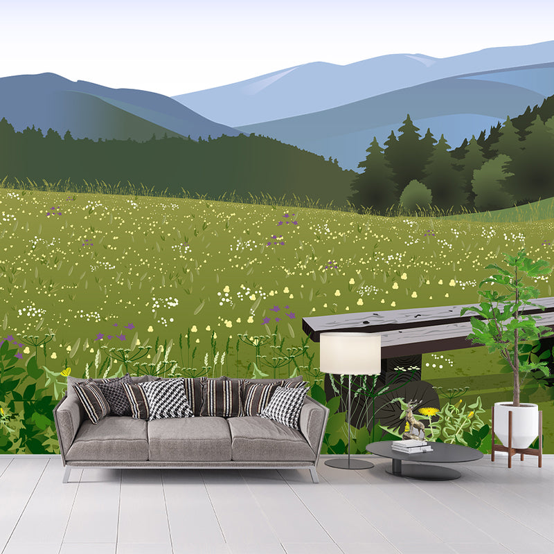 Landscape wall mural behind a sofa