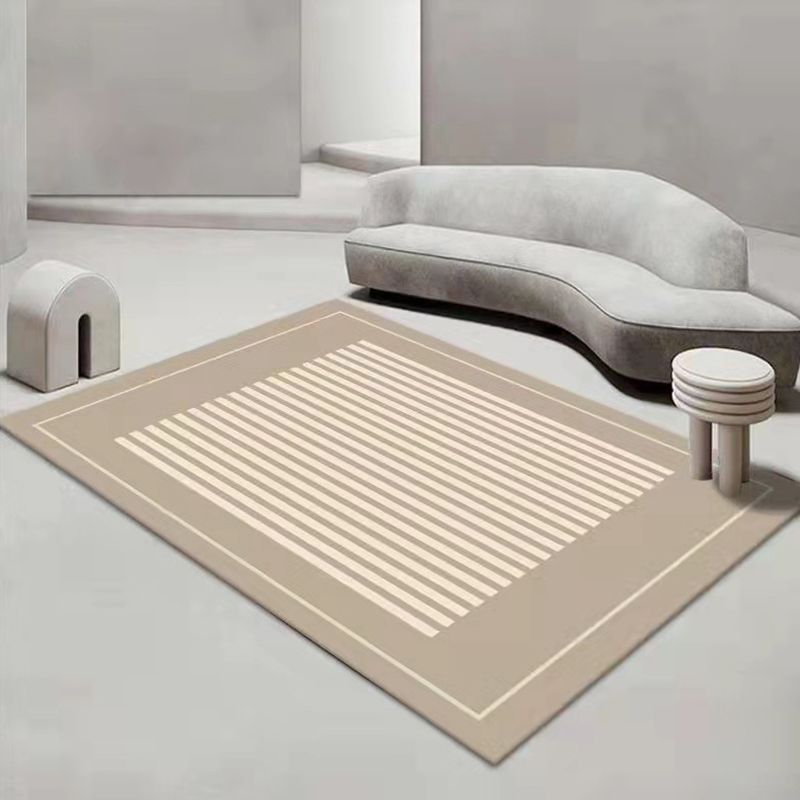 Striped rectangular area rug in a sitting room